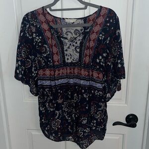 Beautiful red, white, and blue top with tassels and flowy sleeves